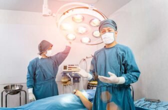 Surgeons preparing for surgery.